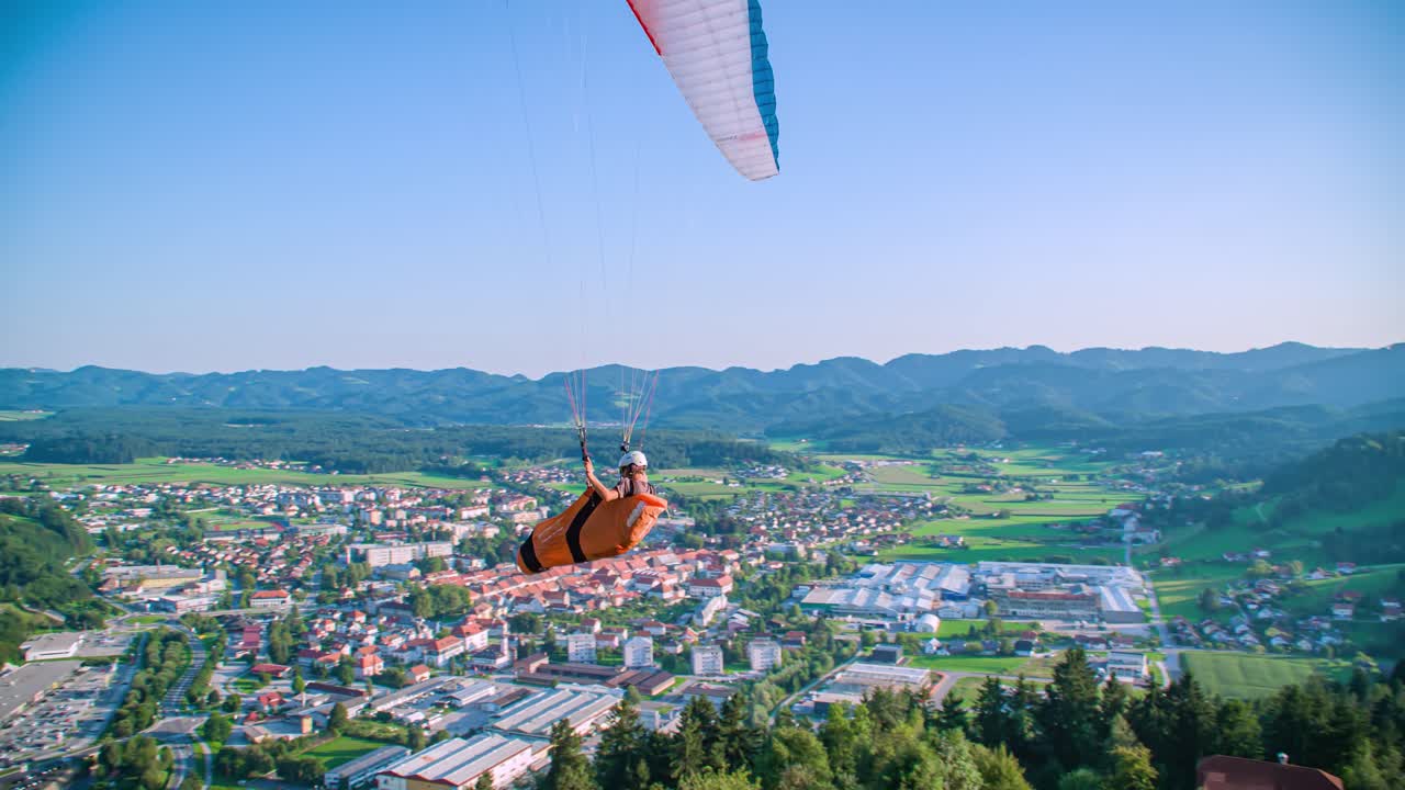 Recreational activity para glider flying over. Taking off from a mountain slope