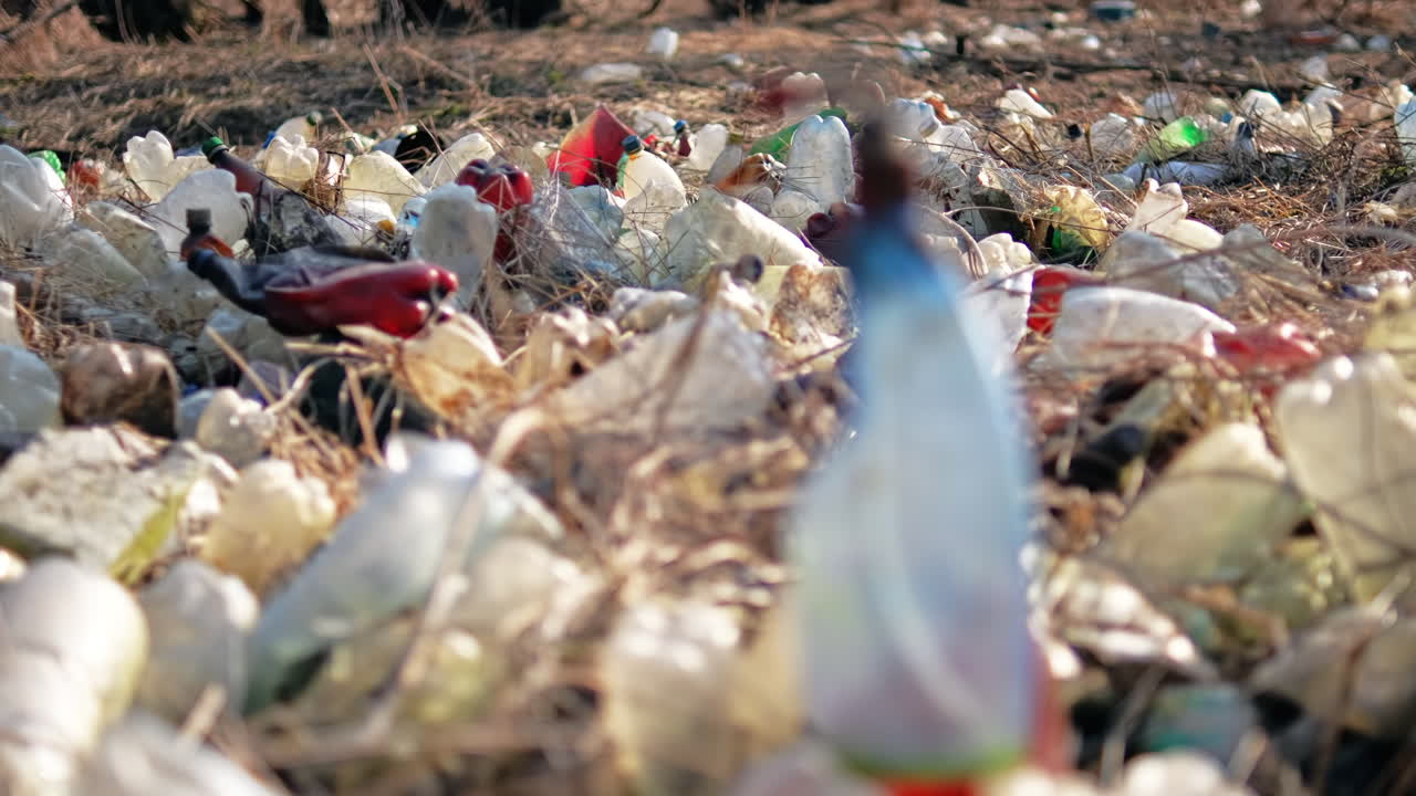 Ground with a lot of scattered plastic bottles