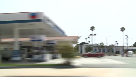 A-Car-Travels-Along-Pacific-Coast-Highway-As-Seen-Through-The-Side-Window-6