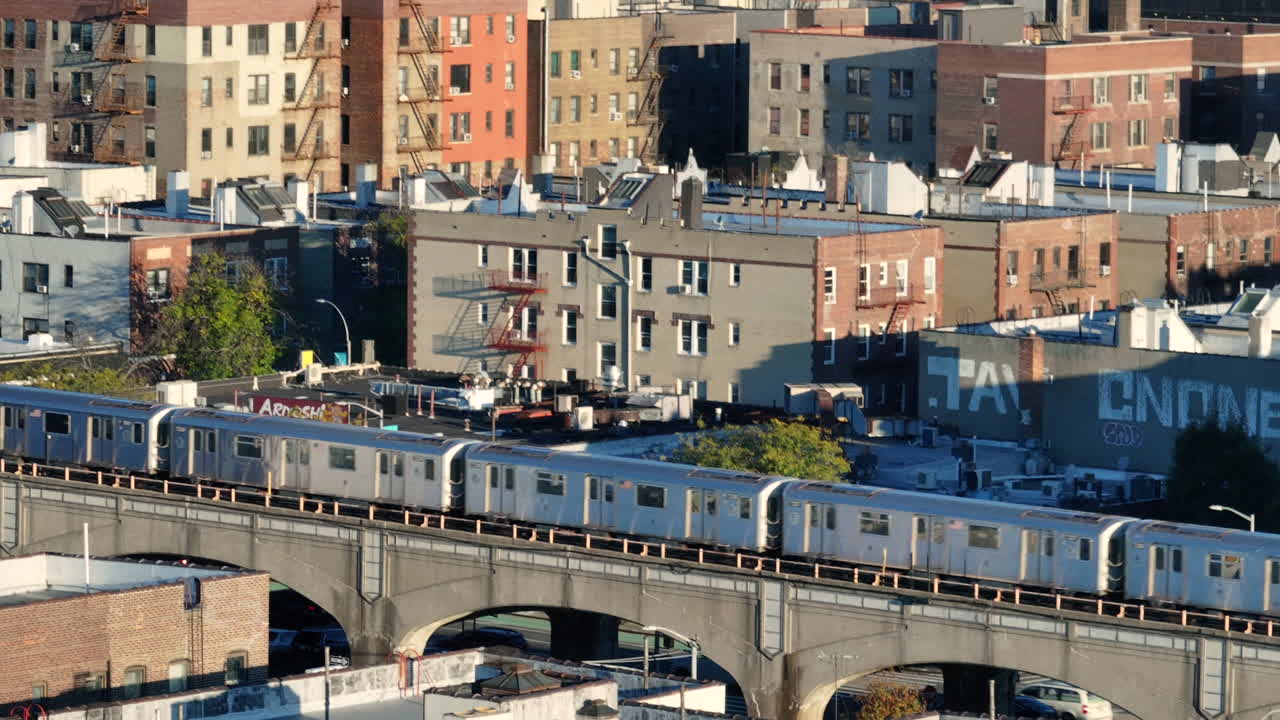 Aerial view of the New York City subway on an autumn morning. Shot in Queens in 4k.