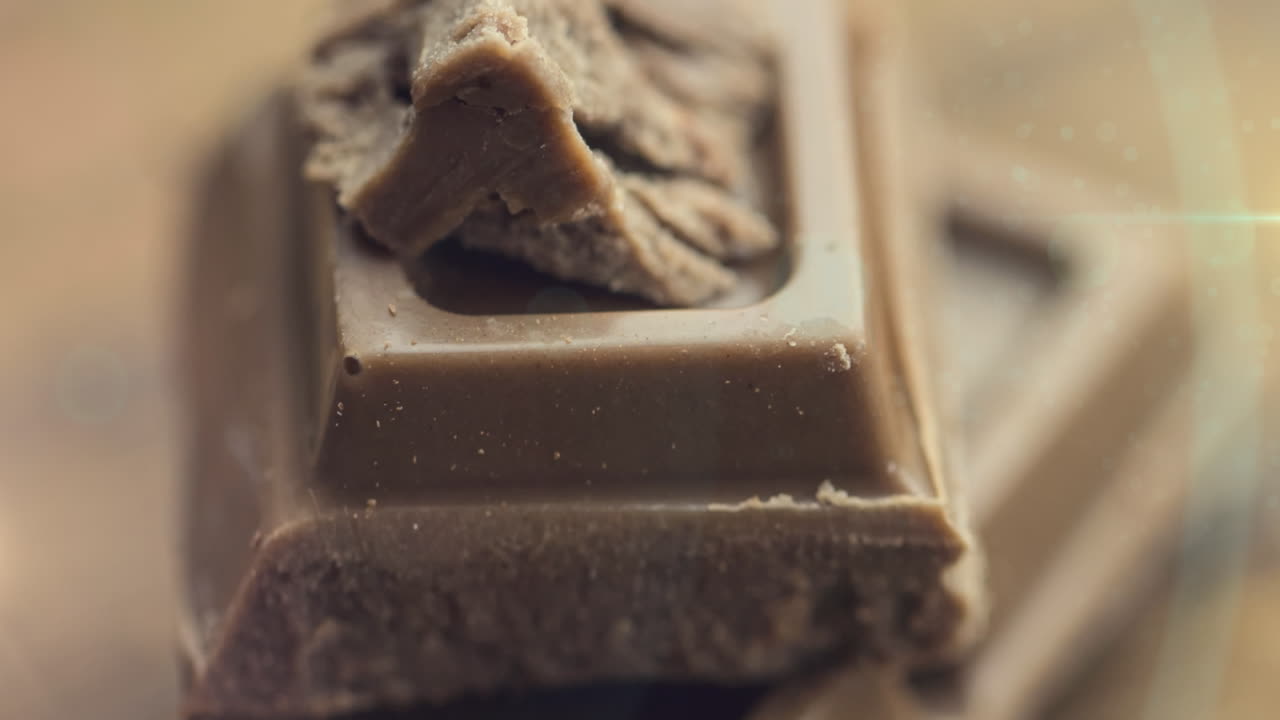animación de la luz sobre el chocolate con leche rota