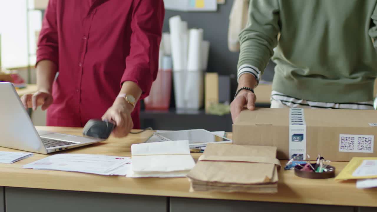 People Working in a Small Business Office