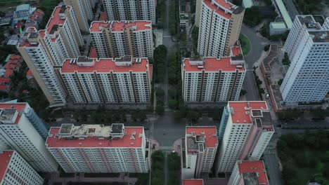 Aerial-top-down-view-over-large-modern-residential-development-on-a-sunny-day-in-Ho-Chi-Minh-City,-Vietnam