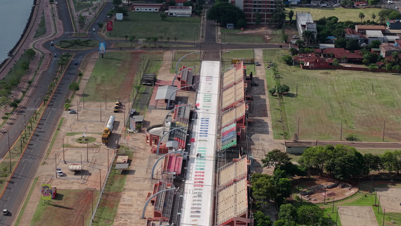 Aerial shot of Sambodromo in Encarnacion, Paraguay with track, stands, and road system visible