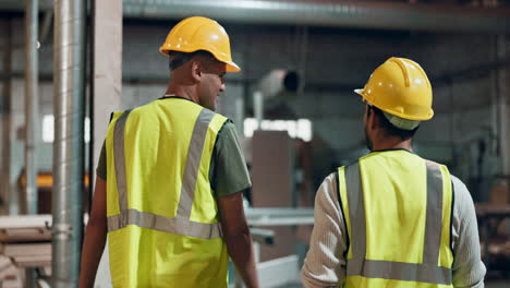 construction workers in a factory