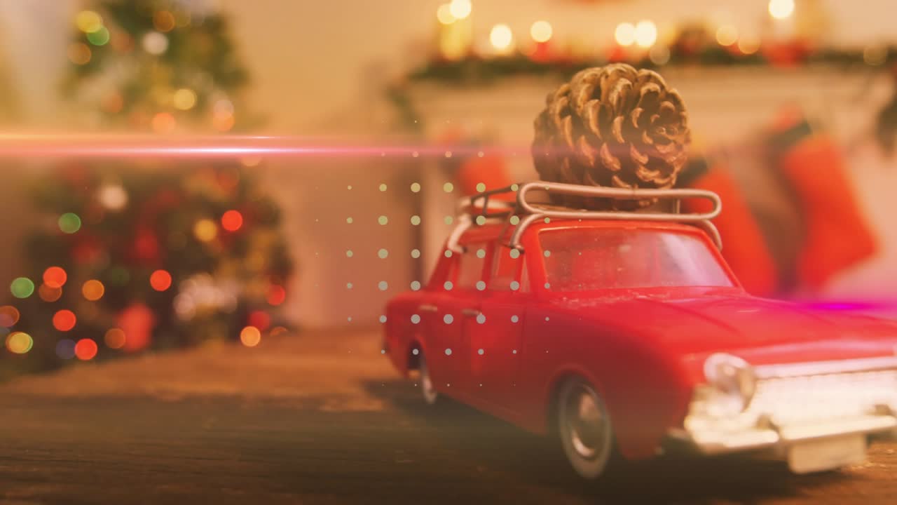 Lens flare drifting starting camera panning and zooming revealing pinecone atop red car for holiday