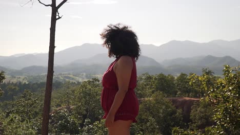 Black-woman-standing-on-top-of-a-canyon-in-northern-Thailand