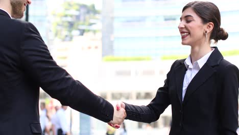 handshake between business people outdoor