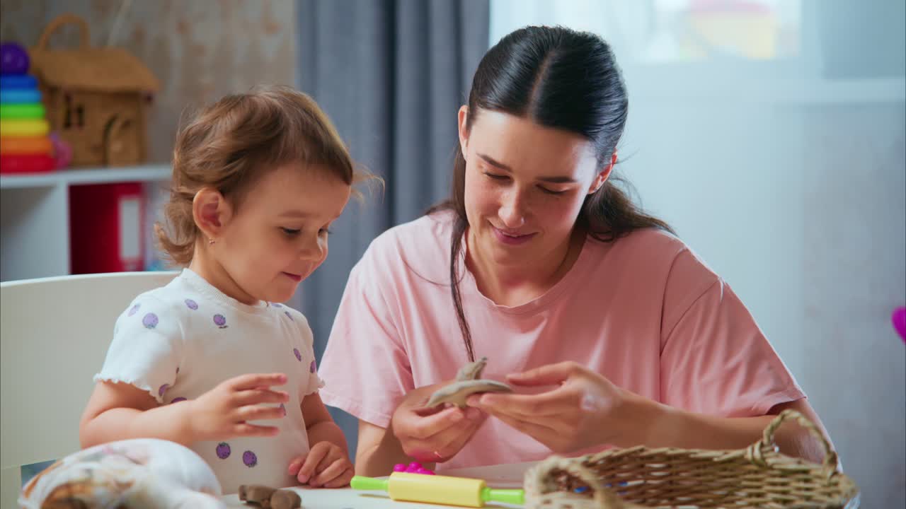 A Caring Interaction Between Mother and Child as They Engage in Creative Play with Craft Materials and Toys at Home, Strengthening Their Emotional Bond