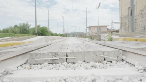 A-man-crossing-an-old-railroad-in-both-directions