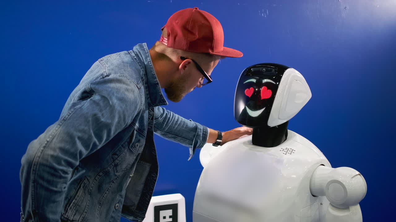 hombre interactuando con un robot amistoso