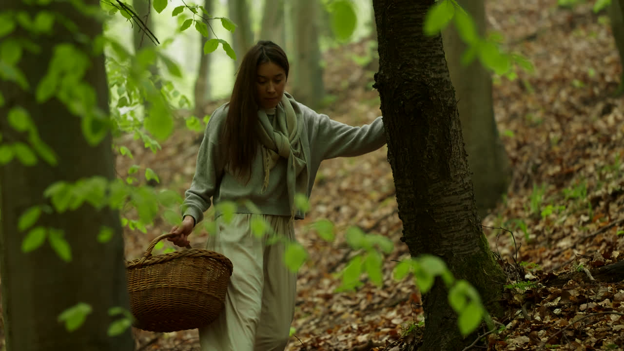 Woman Hiking in the Forest with a Basket