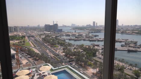 slow moving of point of view to the window in a hotel in dubai united arab emirate