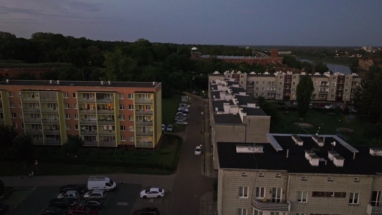 Evening establishing of Nowy Dwor Mazowiecki Poland showing housing and street