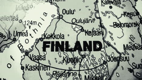 A close-up view of a physical map centered on Finland, showing its cities and neighboring regions