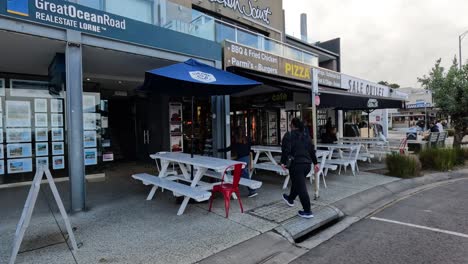 people walking into a restaurant in lorne