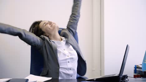 businesswoman working and relaxing in the office