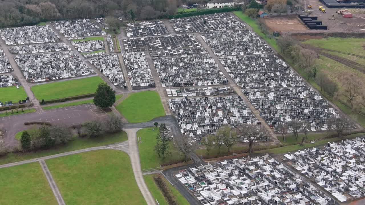 Reverse drone flight over Waltham Cross Jewish cemetery and gravestones