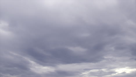 time lapse: stormy white and grey clouds moving across the sky