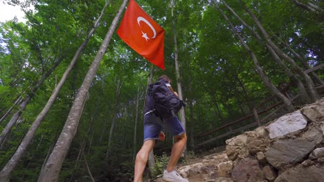 the young man walks in the forests of turkey.