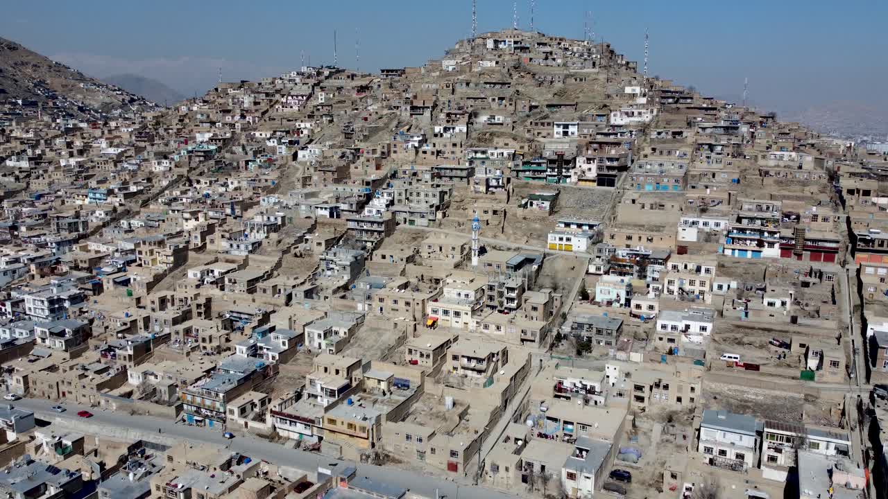 Kabul, Afghanistan. Drone Aerial View of Residential Hillside Neighborhood, Homes in Western Suburbs of Country's Capital
