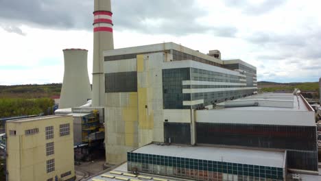 Chvaletice-Power-Station,-Chvaletice,-Czech-Republic---A-Lignite-fired-Power-Stations-with-Smokestacks-and-Cooling-Structures---Pan-Up-Shot