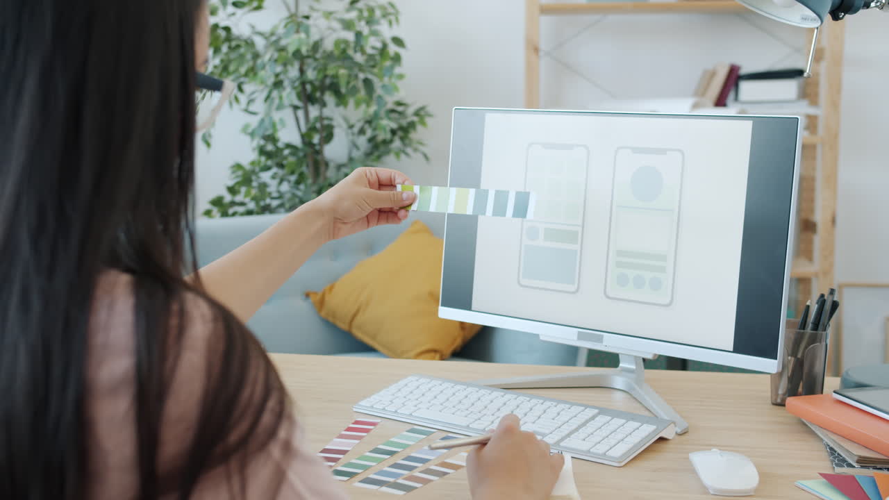 Woman working on mobile app design