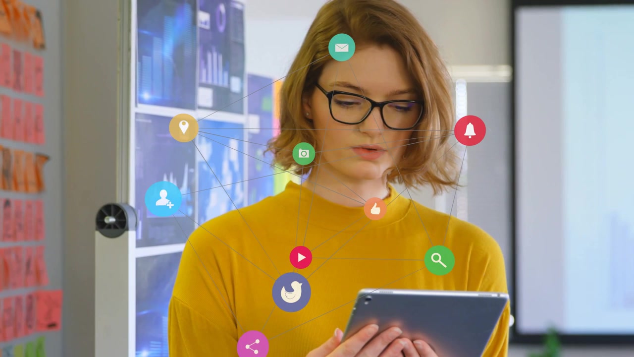 Woman tapping and swiping tablet in business bringing floating apps around face while checking data