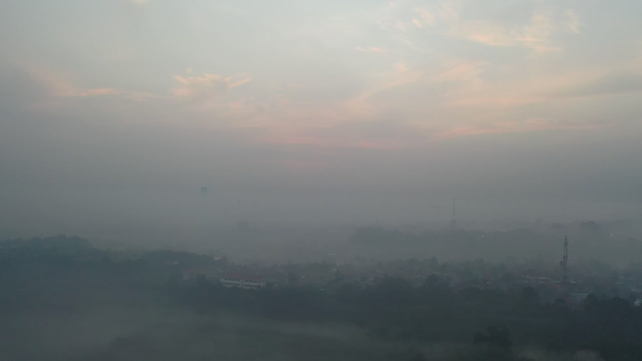 Foggy Sunrise Cityscape