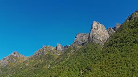 aerial of the peaks and hills around rovde near syvdefjorden in the vanylven municipality, norway