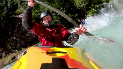 unique point of view of a whitewater kayaker descending class iii river bridge section of the upper rogue river in southern oregon