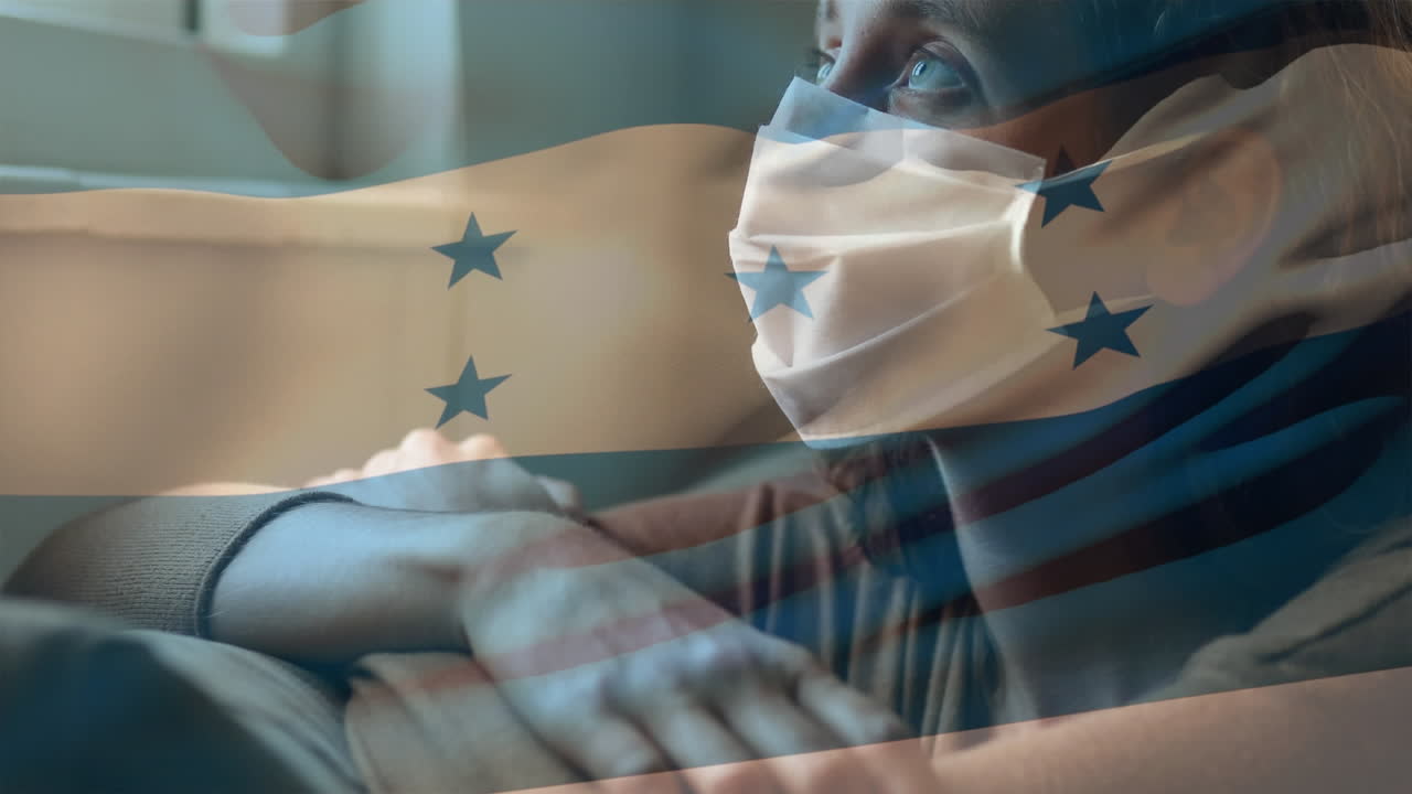 온두라스 발을 흔들고 얼굴 마스크를 착용한 여성