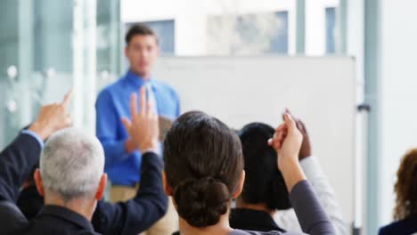 businessman giving a presentation in a meeting