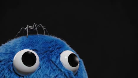 cute blue furry monster with a spider on its head