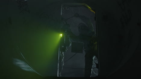 hazardous materials team entering a disturbing tunnel