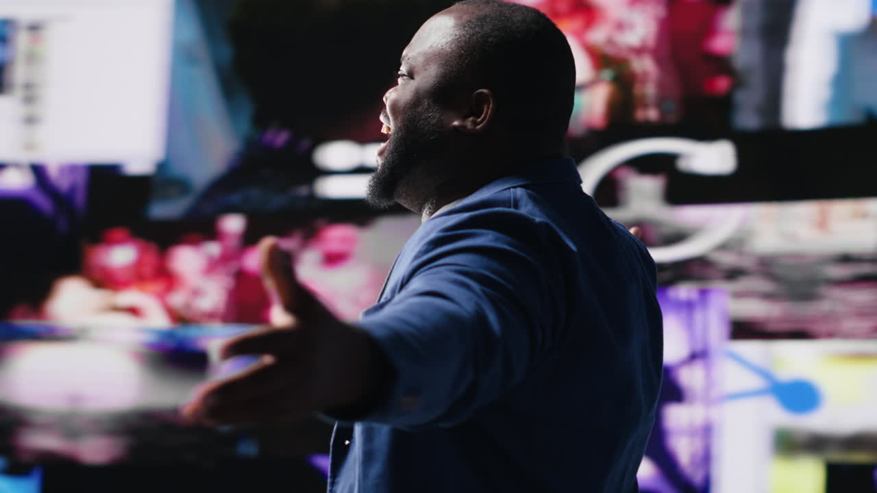 African American professional browses high tech environment with app icons