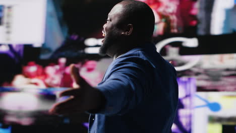 african american professional browses high tech environment with app icons