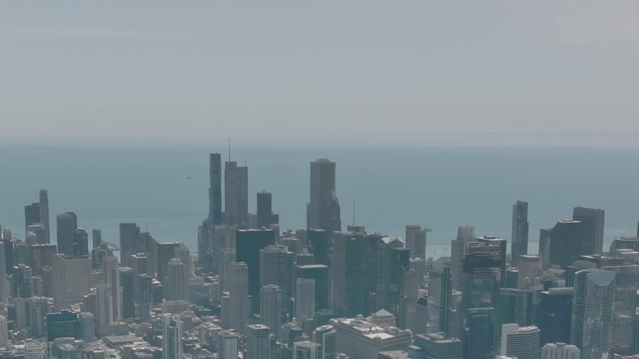 Bird's eye view of downtown Chicago with Lake Michigan in the background