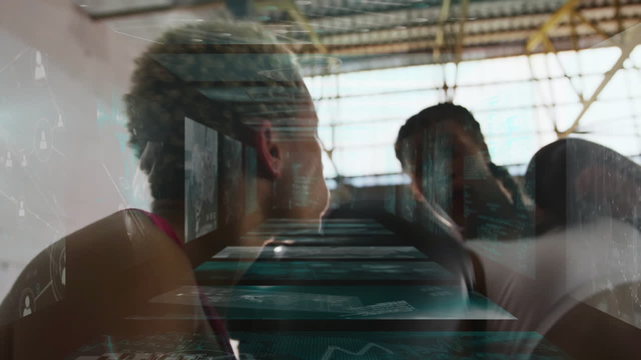 Two female athletes leaning on boxing ring ropes in gym, showcasing floating sports data overlays