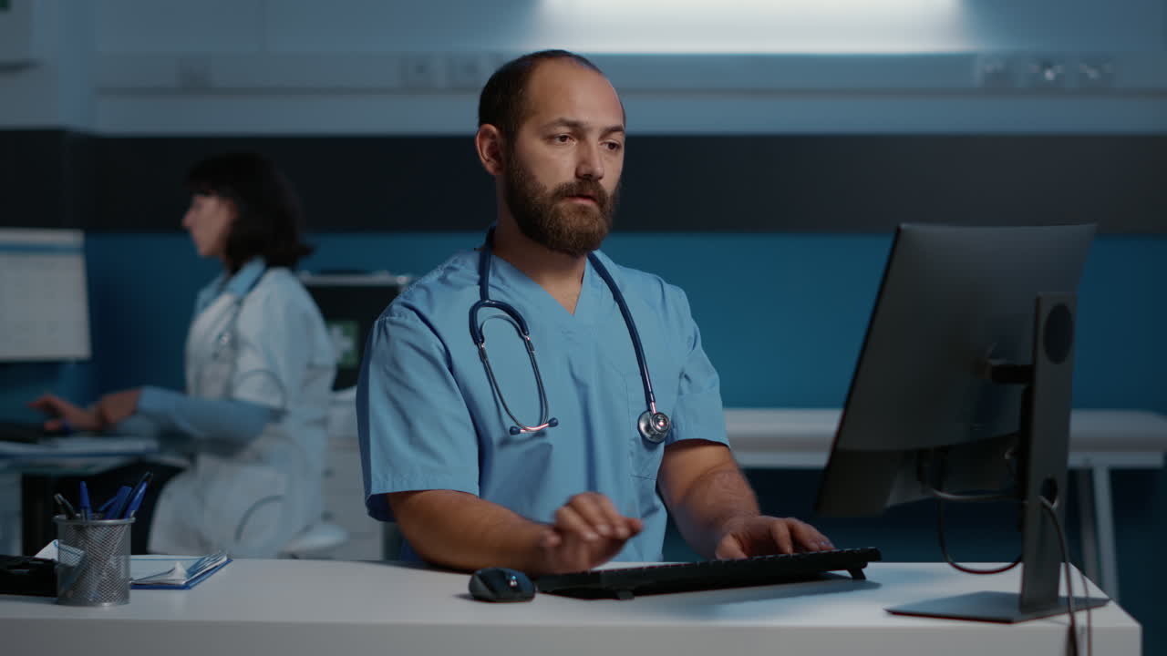 Healthcare workers using computers in a hospital