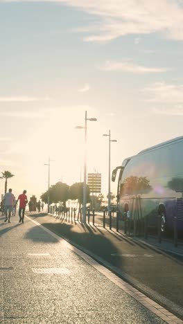 city street scene with bus and people