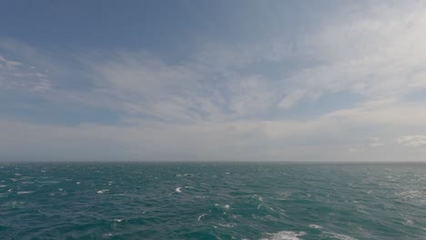 White-caps-appear-on-waves-as-wind-gets-stronger-during-Cook-Strait-crossing-from-South-Island-to-North-Island,-New-Zealand