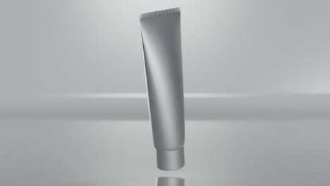 loop animation of plastic tube for cream, cosmetic white package, gel, lotion, scrub, tonic, toothpaste, body care.  model bottle on gray background slowly rotates in air, alpha channel, 3d render