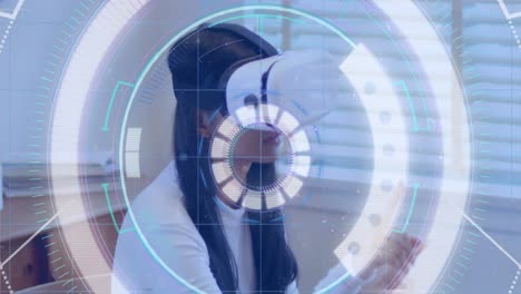 light trails over neon scope scanner against woman gesturing while wearing vr headset at office