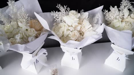 beautiful bouquet of white roses prepared for the wedding