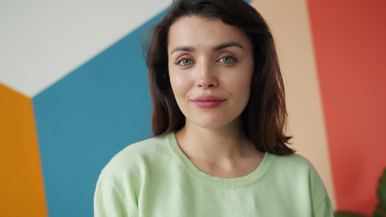 Woman Portrait Against Colorful Wall