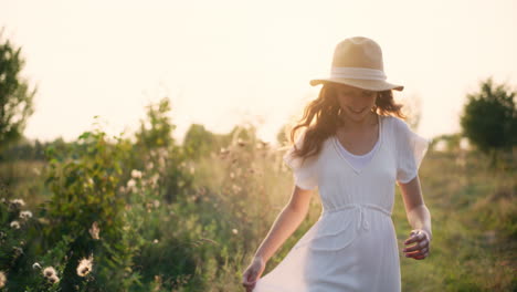 joyful girl runs along path at golden hour