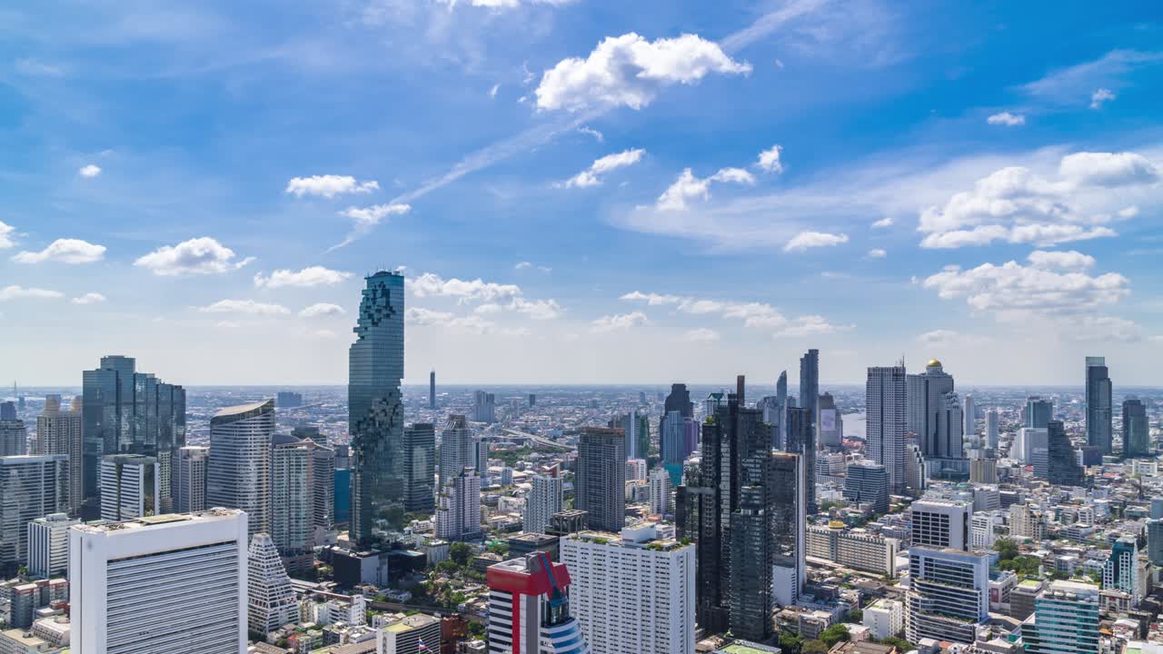 Bangkok business district city center above Silom area, with cloud pass over buildings and skyscrapers – Time Lapse