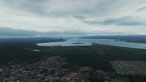 A-bird's-eye-view-captures-the-majestic-Babitonga-Bay-in-São-Francisco-do-Sul,-a-gateway-for-ships-entering-the-port—one-of-Brazil's-top-ten-largest-ports