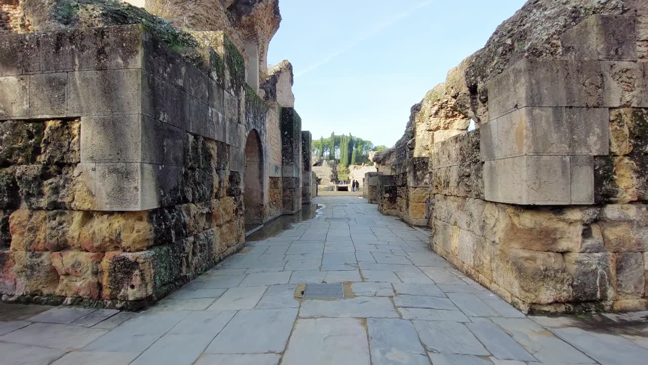 Person entering the Italica amphitheater. Seville, Spain